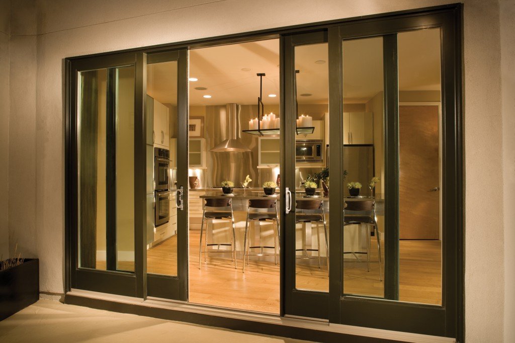 PRO technician repairing a sliding glass door in a Bradenton home