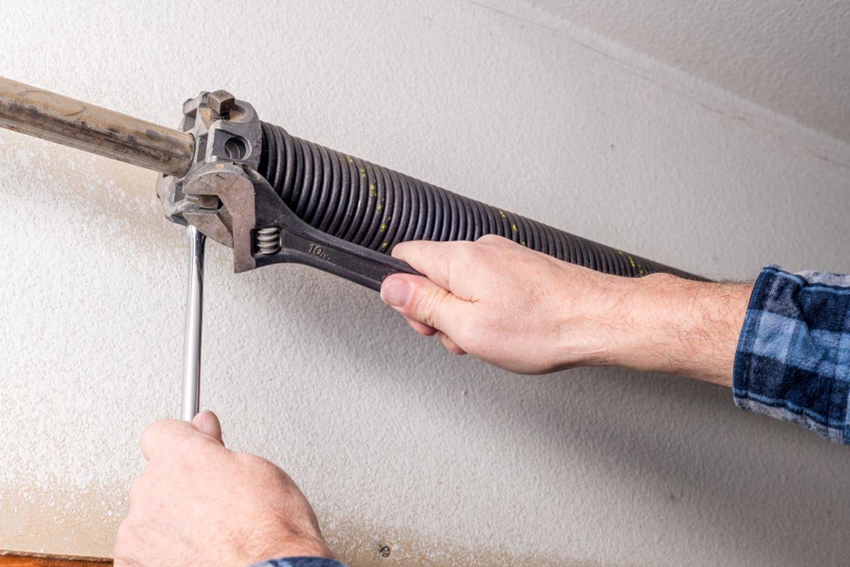 Technician tools representing professional garage door repair