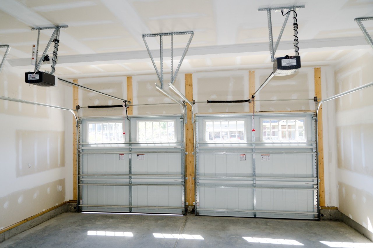 Emerald Garage Door Services technician performing garage door repair