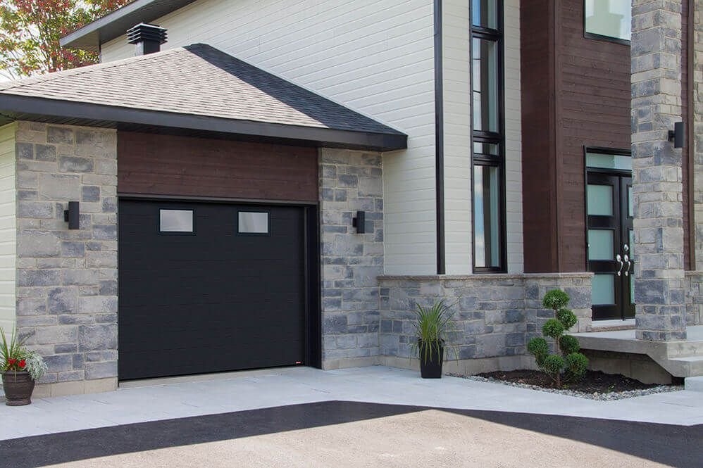 Contemporary home with a professionally installed garage door