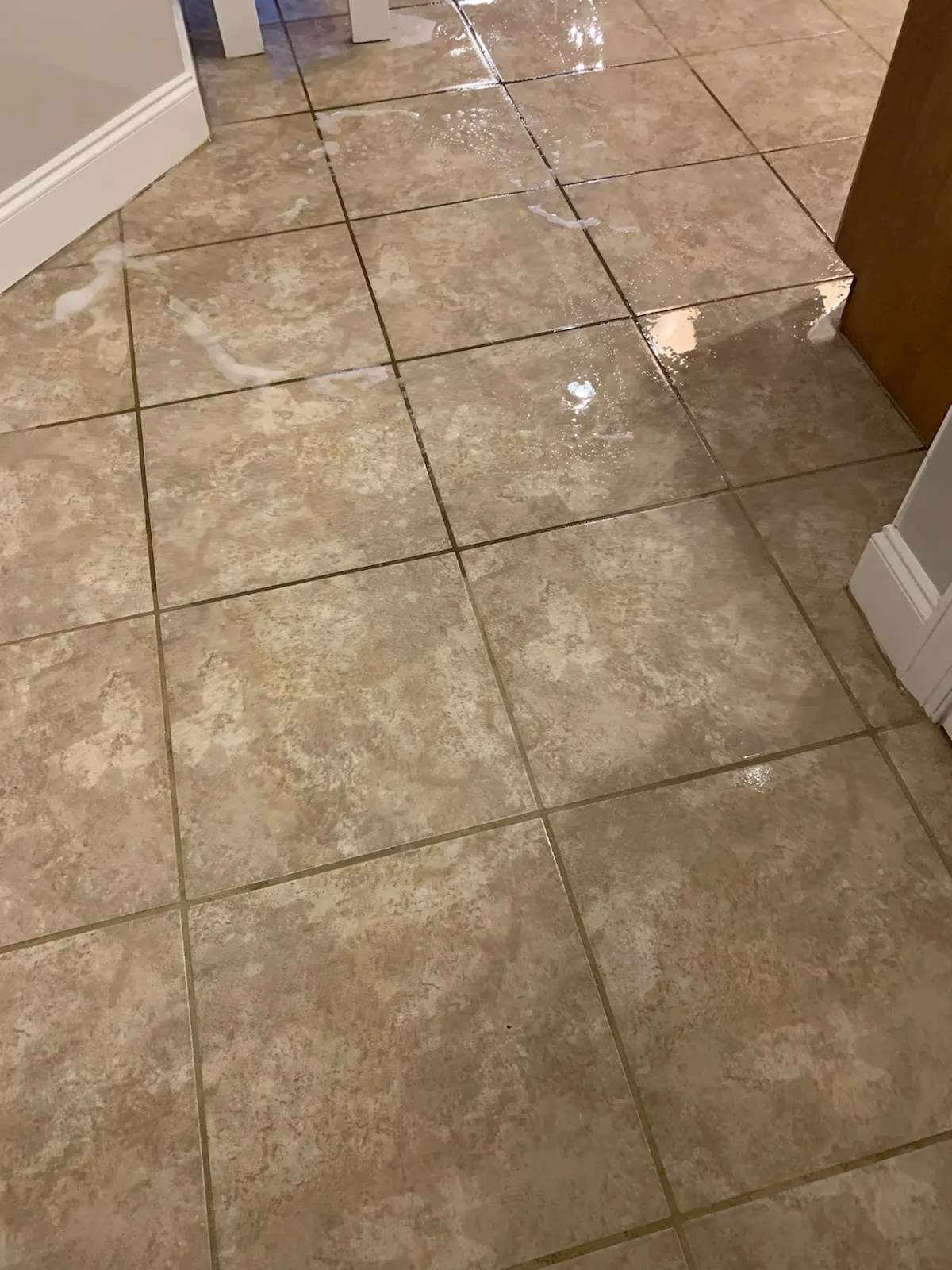 Polished natural stone floor cleaned and sealed in Huntsville AL