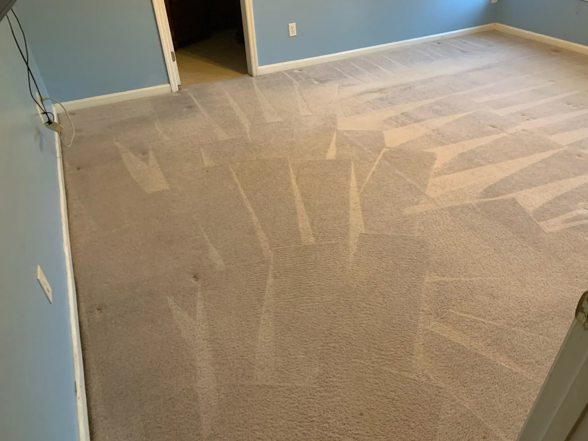 Living room carpet being cleaned inside a Huntsville AL home